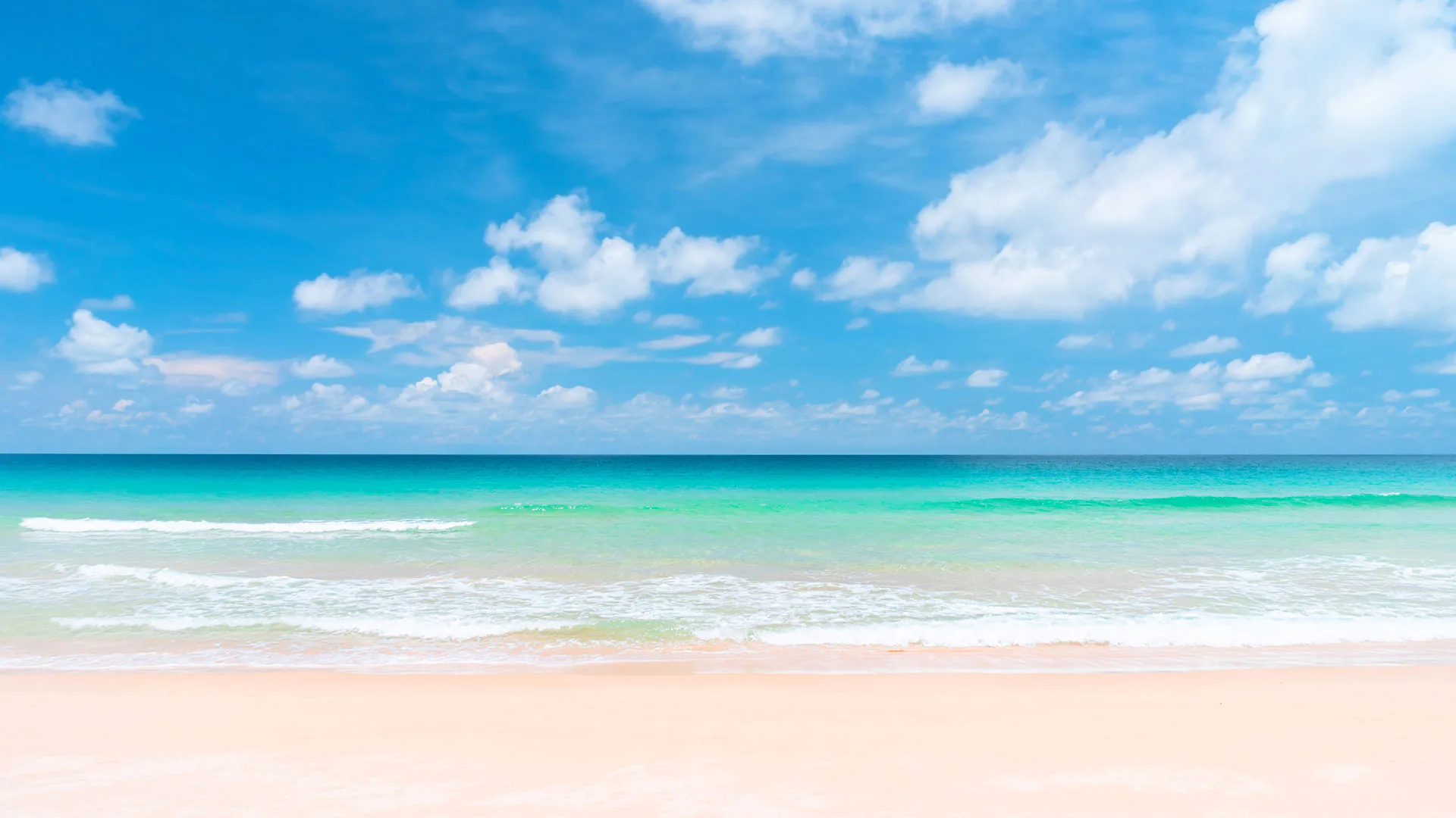 Turquoise sea and tropical island coastline